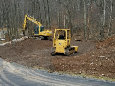 Lot clearing and wall installation